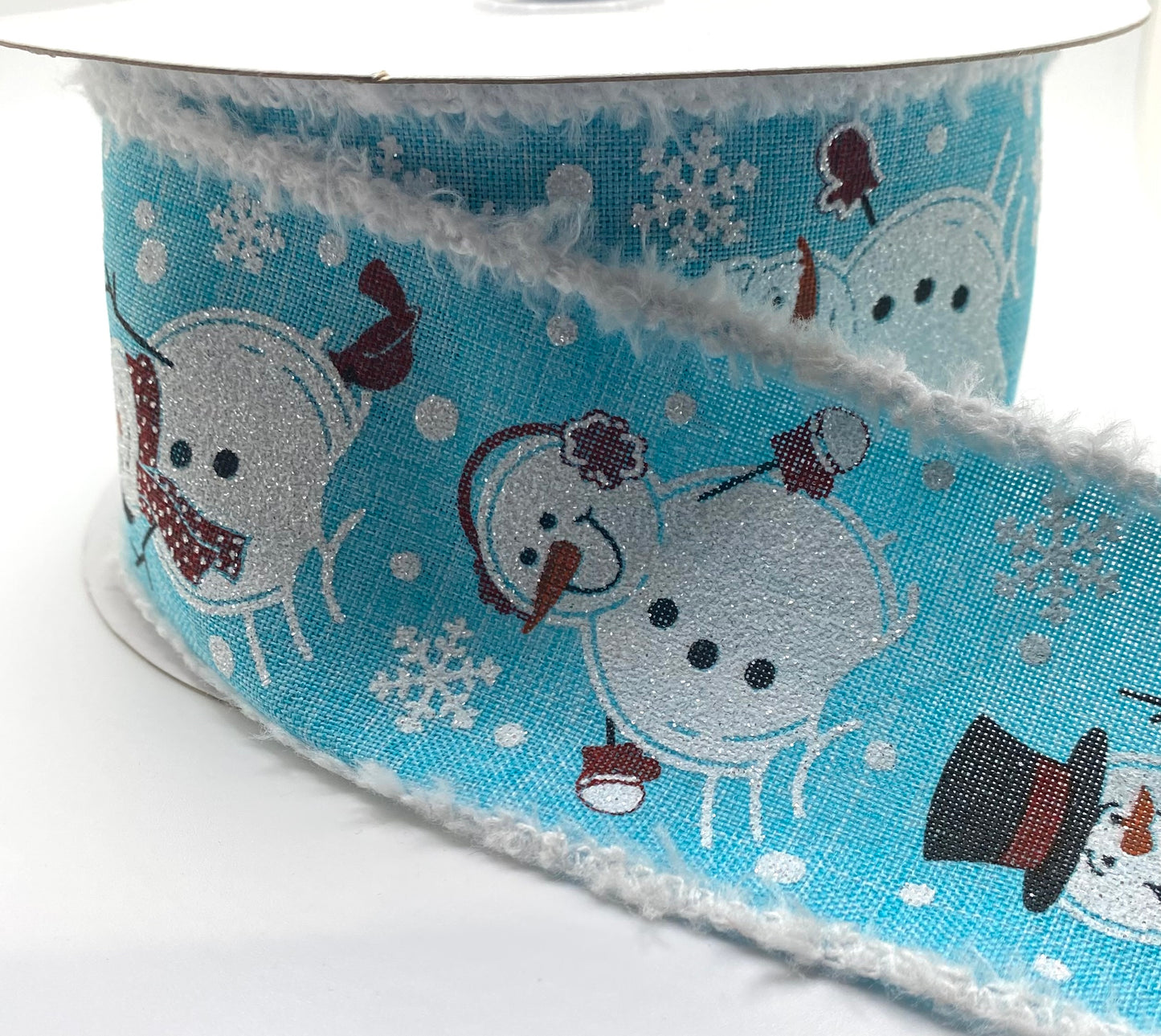 2.5”x 10 Yards- Snowman Ribbon on Light Blue Background with Snowdrift Edge