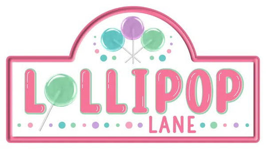 Lollipop Lane Metal Embossed Wreath Sign-15”x8”